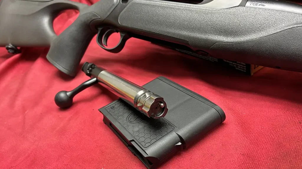 The Sauer 505 bolt is a six-lug design that interfaces directly with the barrel. The Sauer 505 bolt is not only buttery smooth…. but damn near impossible to bind/jam since the diameter matches the raceway path.